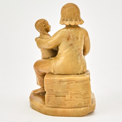 Lot 563 - A Chinese Soapstone Figural Carving