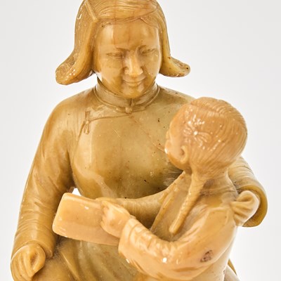 Lot 563 - A Chinese Soapstone Figural Carving