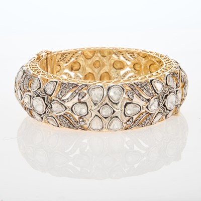 Lot 140 - Gold, Silver and Foil-Backed Diamond Cuff Bangle Bracelet
