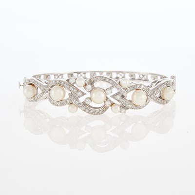 Lot 127 - White Gold, Cultured Pearl and Diamond Bangle Bracelet