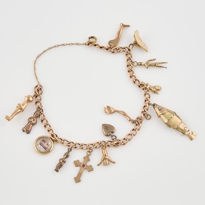 Lot 109 - Gold Charm Bracelet with 14 gold, stone and bead charms attached, 18K, 14K and 10K 16 dwt. all, damaged