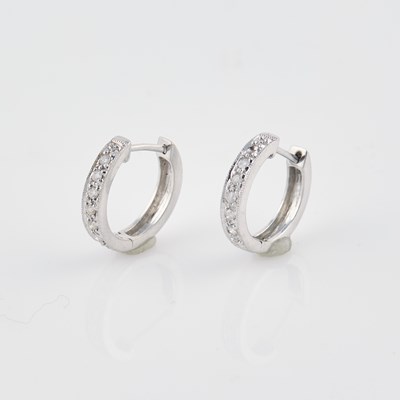Lot 246 - Two Diamond Earrings, 14K 2 dwt., stone missing
