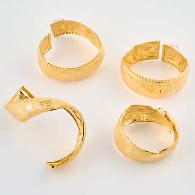 Lot 271 - Four Gold Rigid Bracelets, 22K 33 dwt., damaged