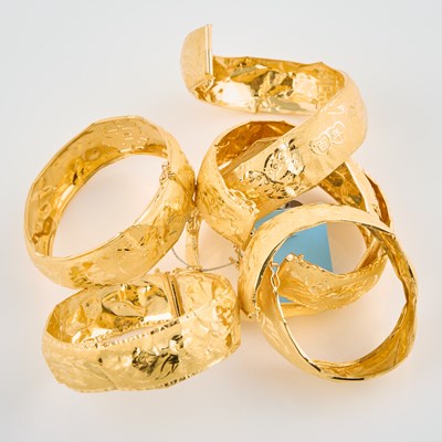 Lot 272 - Six Gold Rigid Bracelets, 24K 31 dwt., damaged