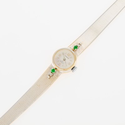 Lot 248 - Lady's White Gold, Emerald and Diamond Wristwatch