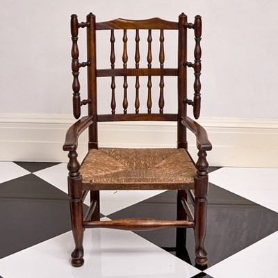 Lot 322 - Lancashire Spindle Back Ash and Rush Arm Chair