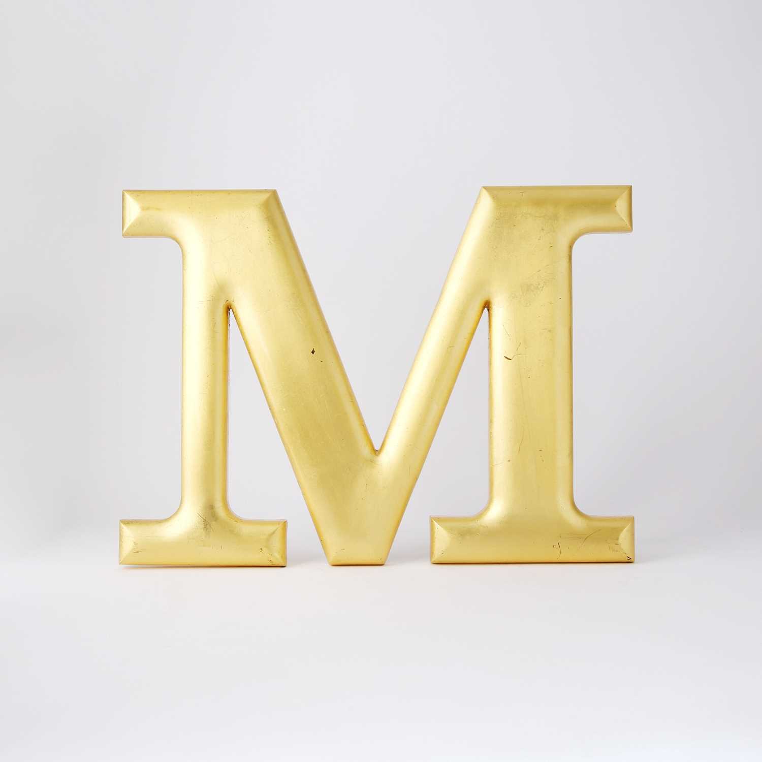 Lot 70 - The iconic screen-used wall-mounted "M" from The Mary Tyler Moore Show