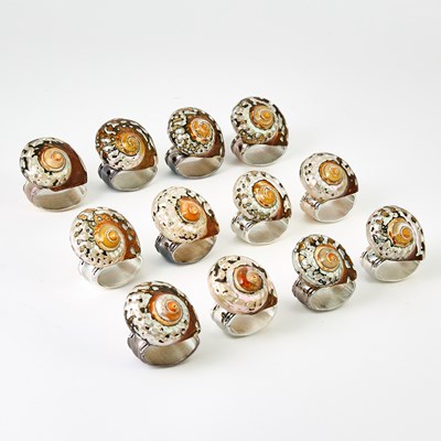 Lot 598 - Set of Twelve Hans Turnwald Shell and Silver Plate Napkin Rings