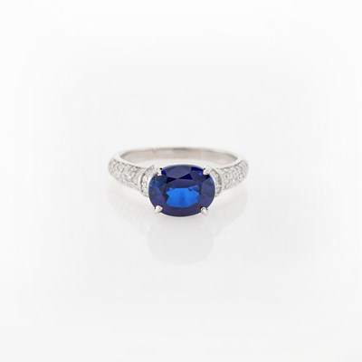 Lot 130 - White Gold, Synthetic Sapphire and Diamond Ring