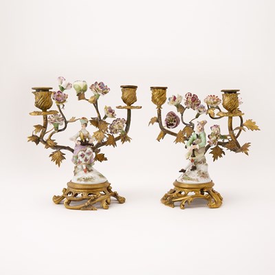 Lot 405 - Pair of Louis XV Style Gilt Metal Porcelain-Mounted Figural Candelabra