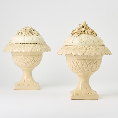 Lot 607 - Two Italian Glazed Earthenware Covered Urns