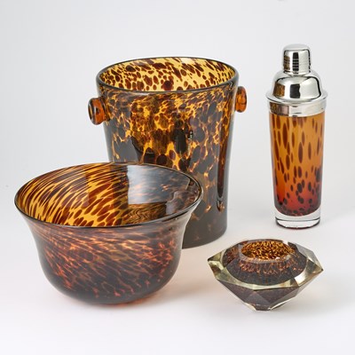 Lot 510 - Four Faux Tortoiseshell Glass Table Articles