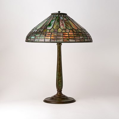 Lot 679 - Tiffany Studios Bronze and Leaded Glass 'Feather’ Table Lamp