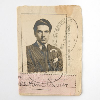 Lot 597 - Sir Laurence Olivier's signed visa from 1929, with a striking photograph of the young actor