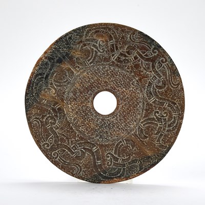 Lot 51 - A Chinese Jade Archaistic Bi Disc