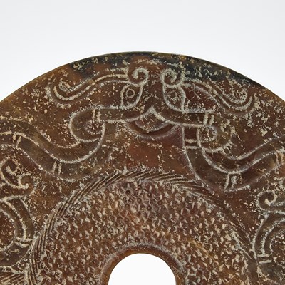Lot 51 - A Chinese Jade Archaistic Bi Disc