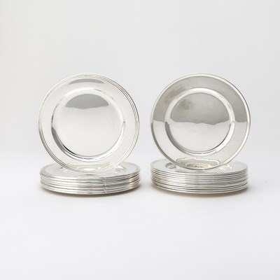 Lot 84 - Set of Twelve Tiffany & Co. and Set of Eight Cartier Sterling Silver Bread Plates