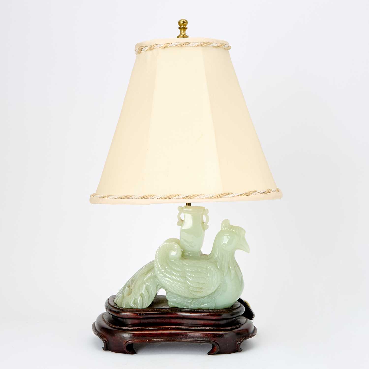 Lot 20 - A Chinese Pale Celadon Jade Carving of a Phoenix
