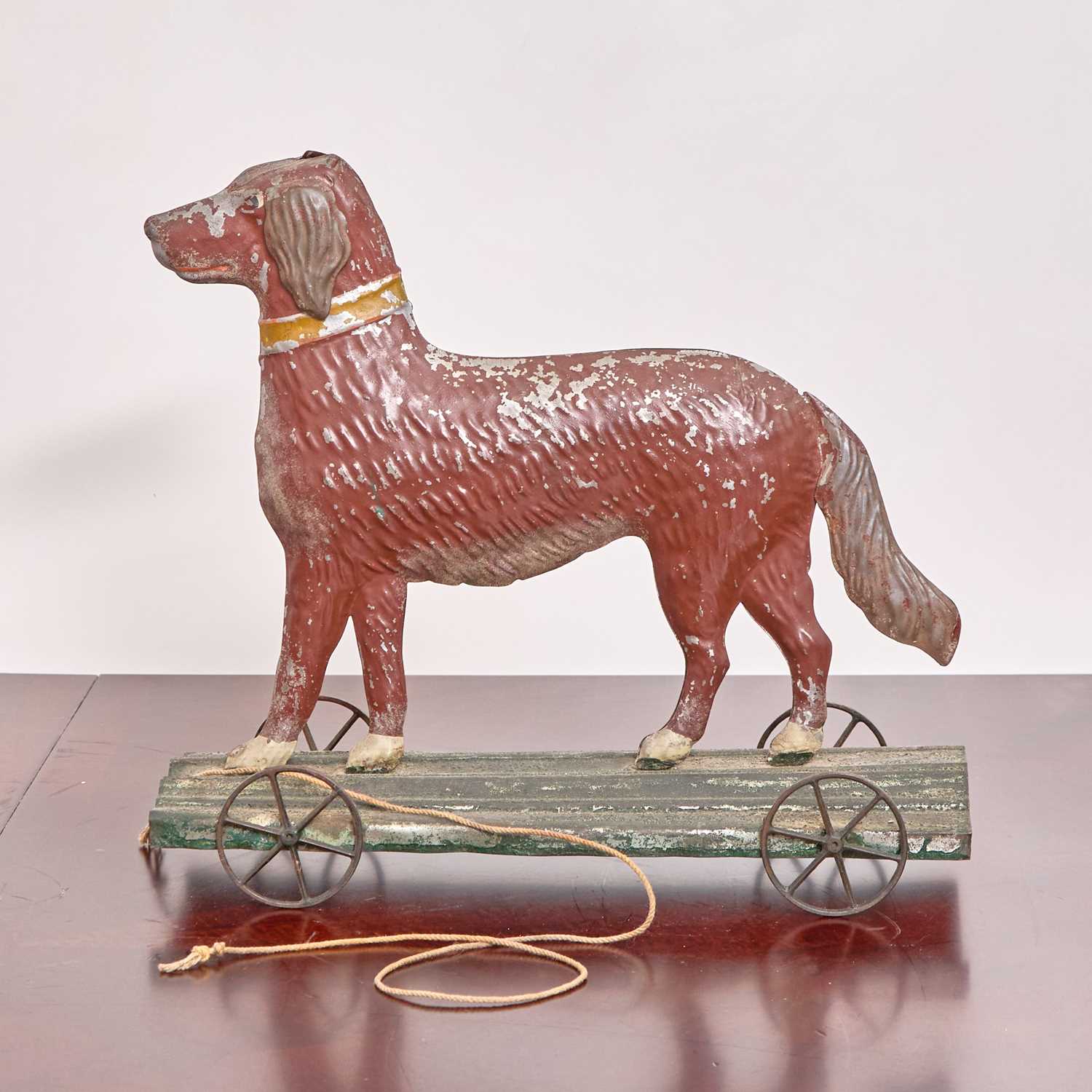 Lot 331 - Victorian Painted Metal Dog Pull Toy