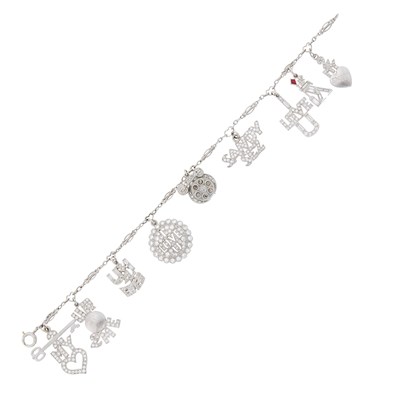 Lot 147 - Platinum and Diamond Charm Bracelet
