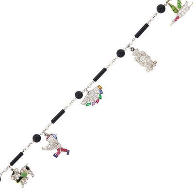 Lot 144 - Platinum, Gold, Black Onyx Bead, Pearl, Diamond, Gem-Set and Enamel Charm Bracelet
