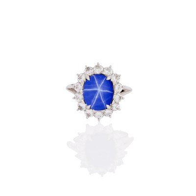Lot 1095 - Platinum, Synthetic Star Sapphire and Diamond Ring