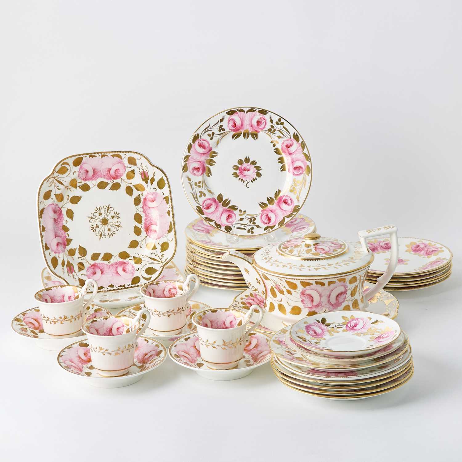 Lot 81 - Assembled English Gilt and Hand-Painted 'Pink Roses' Porcelain Partial Dessert Service