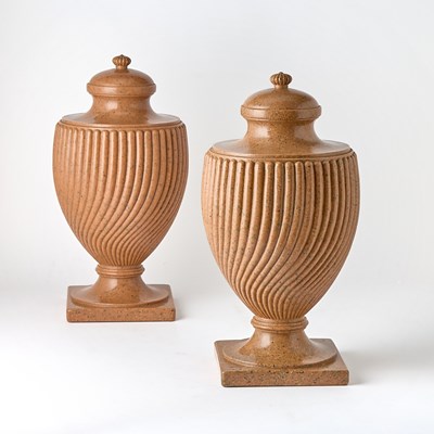 Lot 193 - Pair of Pink Resin Faux Granite Spiral-Gadrooned Covered Footed Urns