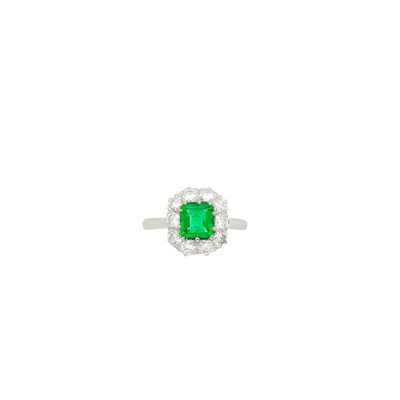 Lot 1061 - Platinum, Emerald and Diamond Ring