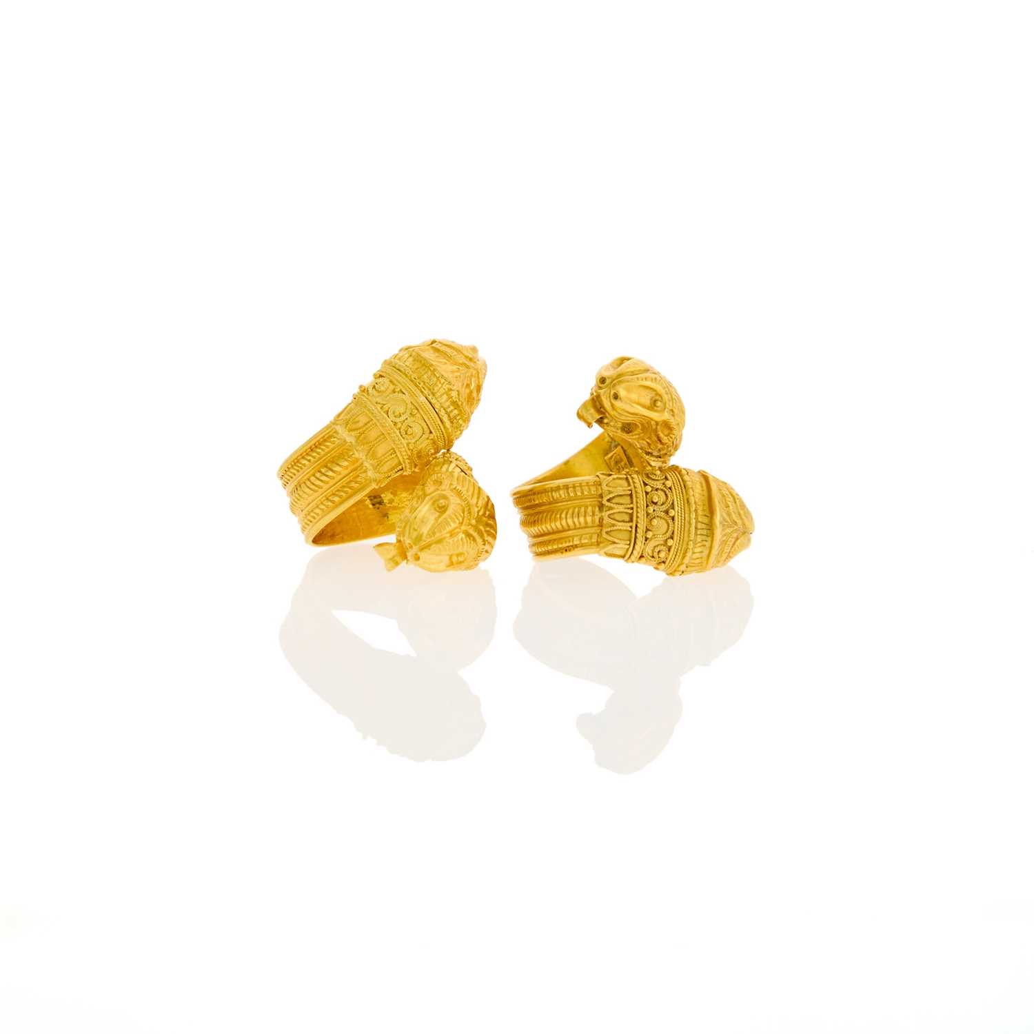 Lot 1044 - Pair of High Karat Gold Chimera Crossover Rings