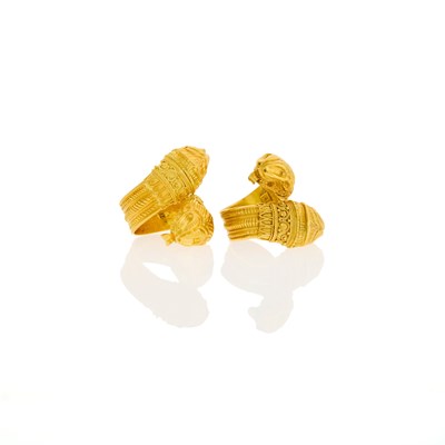 Lot 1044 - Pair of High Karat Gold Chimera Crossover Rings