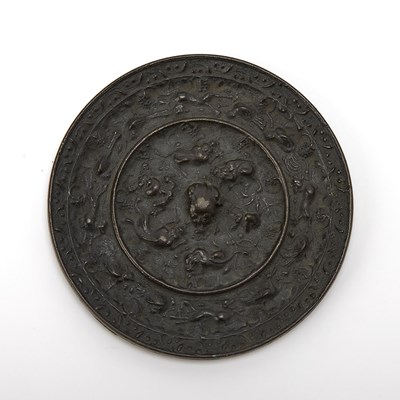 Lot 63 - A Chinese Bronze Mirror