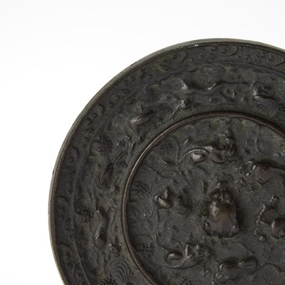 Lot 63 - A Chinese Bronze Mirror