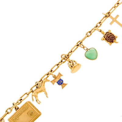 Lot 1049 - Gold and Low Karat Gold Charm Bracelet