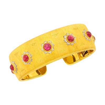 Lot 46 - Buccellati Two-Color Gold and Cabochon Ruby Cuff Bangle Bracelet