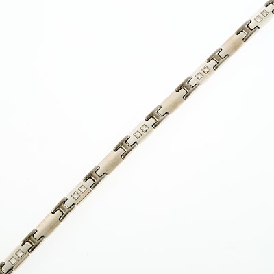 Lot 1204 - Two-Color Gold and Diamond Bracelet