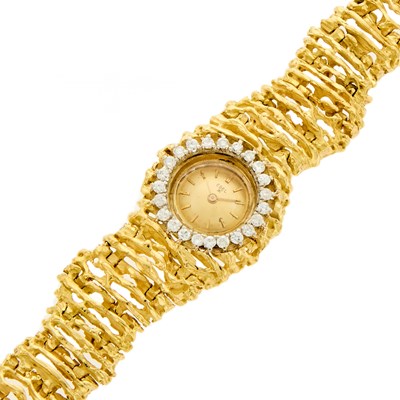 Lot 2085 - Ebel Lady's Gold and Diamond Wristwatch
