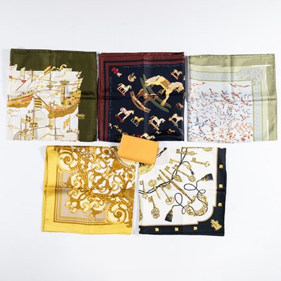Lot 1376 - Hermès Tan Leather Clutch and Group of Silk Scarves