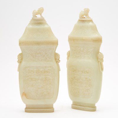 Lot 2 - A Pair of Chinese White Jade Flattened Vases and Covers