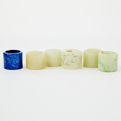 Lot 458 - Six Chinese Hardstone Thumb Rings
