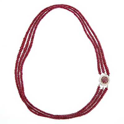 Lot 2074 - Multistrand Ruby Bead Necklace with White Gold, Ruby and Diamond Clasp