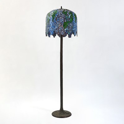 Lot 307 - Tiffany Style Patinated Metal and Leaded Glass Wisteria Floor Lamp