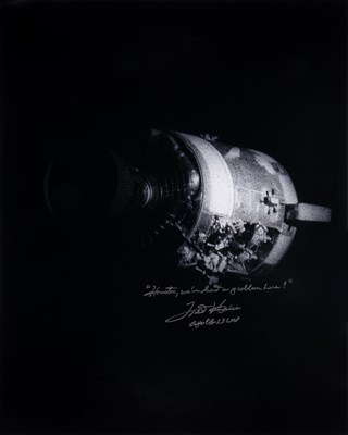 Lot 230 - Two Apollo 13 photographs inscribed by astronaut Fred Haise