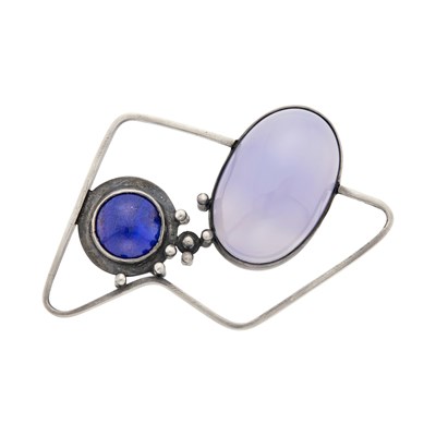 Lot 1063 - Margaret De Patta Mid-Century Silver, Blue Chalcedony and Lapis Brooch
