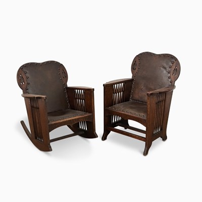 Lot 1065 - Two English Arts and Crafts Oak Chairs