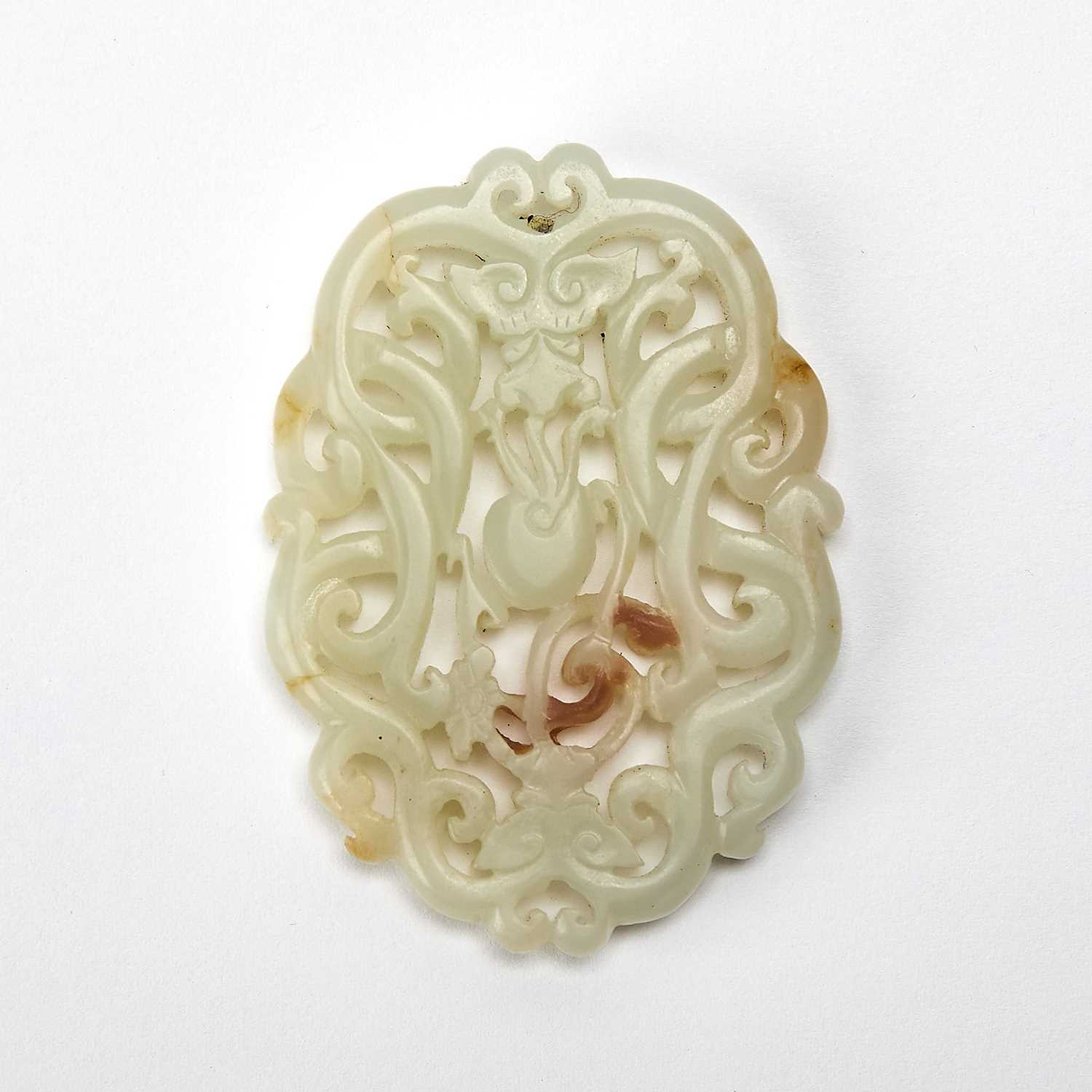 Lot 21 - A Chinese White Jade Openwork Plaque
