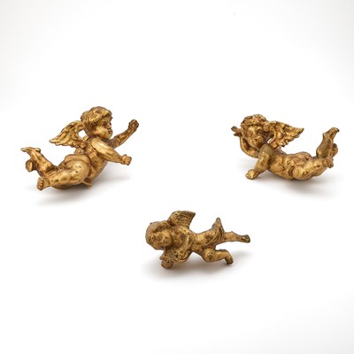 Lot 157 - Group of Three Continental Baroque Style Carved Giltwood Cherubs