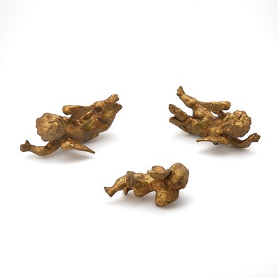 Lot 157 - Group of Three Continental Baroque Style Carved Giltwood Cherubs