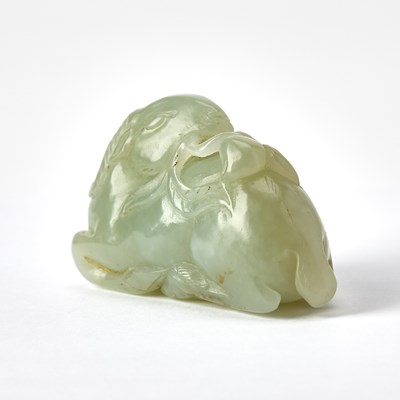 Lot 36 - A Chinese Celadon Jade Carving of a Ram