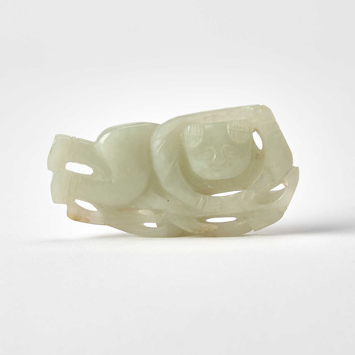 Lot 47 - A Chinese White Jade Figural Carving